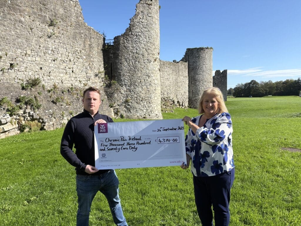 Turning Remembrance into Hope - pictured cheque presentation by fundraiser John Cully