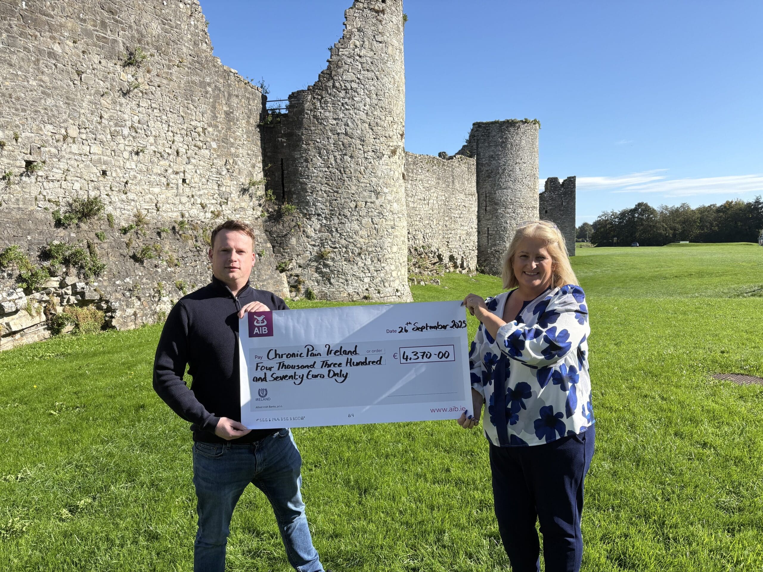 Turning Remembrance into Hope - pictured cheque presentation by fundraiser John Cully